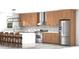 Modern kitchen with stainless steel appliances, a kitchen island with seating, and wooden cabinets at 2585 Governors Walk Blvd, Snellville, GA 30078