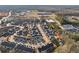 An aerial view of a residential community with well-maintained lawns, sidewalks, and convenient access to nearby amenities at 334 Cherokee Station Cir, Woodstock, GA 30188