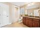 Bathroom featuring vanity with granite counters and shower-tub combo at 334 Cherokee Station Cir, Woodstock, GA 30188