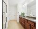 Large primary bathroom featuring a double sink vanity and separate shower at 334 Cherokee Station Cir, Woodstock, GA 30188