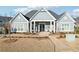 Community clubhouse with inviting entrance, manicured landscaping, and accessible parking at 334 Cherokee Station Cir, Woodstock, GA 30188