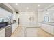 Gourmet community kitchen features granite countertops, stainless steel appliances, and modern cabinetry at 334 Cherokee Station Cir, Woodstock, GA 30188