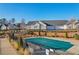 A covered community pool with a pool house is the focal point in this neighborhood at 334 Cherokee Station Cir, Woodstock, GA 30188