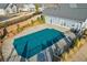A lovely green pool cover protecting the community pool for the winter season at 334 Cherokee Station Cir, Woodstock, GA 30188