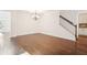 Dining area with hardwood floors next to the staircase at 334 Cherokee Station Cir, Woodstock, GA 30188