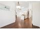 Entryway with hardwood floors looking into the living room and kitchen at 334 Cherokee Station Cir, Woodstock, GA 30188