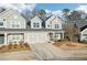 Charming gray townhome with attached garage and long driveway at 334 Cherokee Station Cir, Woodstock, GA 30188