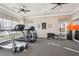 Fitness center featuring treadmills, weights and other exercise equipment with natural light at 334 Cherokee Station Cir, Woodstock, GA 30188