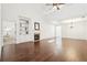 Spacious living room with hardwood floors, fireplace and built in shelving under a vaulted ceiling at 334 Cherokee Station Cir, Woodstock, GA 30188