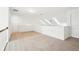 Spacious loft area with neutral carpet and natural light at 334 Cherokee Station Cir, Woodstock, GA 30188