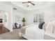 Bright main bedroom featuring a trey ceiling, ceiling fan, and windows for natural light at 334 Cherokee Station Cir, Woodstock, GA 30188