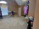 Upstairs bedroom with a large open closet and an ironing board at 3381 Walkers Ridge Rd, Dacula, GA 30019