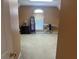 An upstairs bedroom with a window, furnishings, and plenty of open carpeted floor space at 3381 Walkers Ridge Rd, Dacula, GA 30019