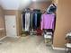 Large walk-in closet with lots of space for storage on shelving and racks at 3381 Walkers Ridge Rd, Dacula, GA 30019
