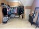 Huge walk-in closet with lots of room for storage on shelving and hanging rods at 3381 Walkers Ridge Rd, Dacula, GA 30019