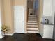Hallway with stairs and white cabinets at 3381 Walkers Ridge Rd, Dacula, GA 30019