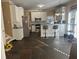 Spacious eat-in kitchen features stainless steel appliances, granite countertops, and bar seating at 3381 Walkers Ridge Rd, Dacula, GA 30019