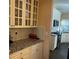 Well-appointed kitchen featuring granite counters, subway tile backsplash, and white cabinetry at 3381 Walkers Ridge Rd, Dacula, GA 30019