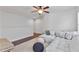 Upstairs bonus room features a ceiling fan and lounge area at 4233 Hardy Ave, Smyrna, GA 30082