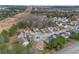 Aerial shot of a residential neighborhood featuring charming homes and lush greenery at 6498 Stonelake Sw Pl, Atlanta, GA 30331