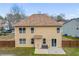 Exterior view of home shows backyard, patio and fenced-in yard at 6498 Stonelake Sw Pl, Atlanta, GA 30331