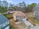 Beautiful two-story home with a two-car garage and manicured lawn at 6498 Stonelake Sw Pl, Atlanta, GA 30331