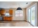 Kitchen area with breakfast nook and sliding glass door to the backyard at 6498 Stonelake Sw Pl, Atlanta, GA 30331