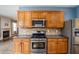 Updated kitchen boasts stainless steel appliances and stylish backsplash at 6498 Stonelake Sw Pl, Atlanta, GA 30331