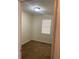 Carpeted bedroom with blinds and neutral wall paint at 6950 Oakhill Se Cir, Austell, GA 30168