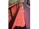 Red wood deck and railing on the side of a house at 6950 Oakhill Se Cir, Austell, GA 30168