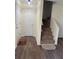 Entryway features a staircase leading upstairs and tile floors at 6950 Oakhill Se Cir, Austell, GA 30168