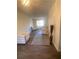 Bright living room features hardwood floors, modern furniture, and neutral paint at 6950 Oakhill Se Cir, Austell, GA 30168