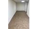 A versatile room with neutral walls and carpet is ready for your personal touch at 6950 Oakhill Se Cir, Austell, GA 30168