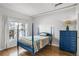 Bright bedroom with hardwood floors and a large window at 800 Peachtree Ne St # 1320, Atlanta, GA 30308