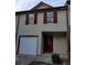 Two-story home featuring red shutters and a single-car garage at 2303 Pine Tree Trl, Atlanta, GA 30349