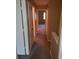 Hallway with multiple doors leading to other rooms at 2303 Pine Tree Trl, Atlanta, GA 30349