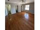 Spacious main bedroom with ensuite bathroom and hardwood floors at 1686 Valencia Rd, Decatur, GA 30032