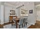 Dining area with hardwood floors and a view into the kitchen at 850 Piedmont Ave # 2102, Atlanta, GA 30308