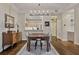 Dining area with hardwood floors next to a modern kitchen at 850 Piedmont Ave # 2102, Atlanta, GA 30308