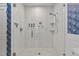 Stylish shower with white subway tile, glass door, and a rainfall showerhead at 850 Piedmont Ave # 2102, Atlanta, GA 30308