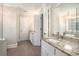 Spacious bathroom features a glass shower, granite countertops, and bright lighting at 194 Preston Nw Pl, Dallas, GA 30157