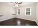 Bedroom featuring wood floors, neutral paint and two sunny windows at 194 Preston Nw Pl, Dallas, GA 30157