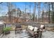 Outdoor deck featuring wicker seating and wooded views at 194 Preston Nw Pl, Dallas, GA 30157