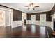 Spacious living room featuring hardwood floors, fireplace, and an open floor plan at 194 Preston Nw Pl, Dallas, GA 30157