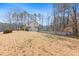 Well-maintained front yard with lush greenery, trees, and view of the home's exterior at 194 Preston Nw Pl, Dallas, GA 30157