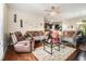 Comfortable living room featuring cozy furniture, natural light, and stylish décor at 2126 Sawgrass Dr, Hampton, GA 30228