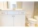 Bright bathroom featuring a white vanity, and toilet at 464 Eager Ct, Marietta, GA 30064