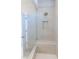 Luxurious tiled shower with a glass door and a built-in seat and niche at 464 Eager Ct, Marietta, GA 30064