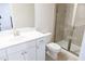 Updated bathroom featuring tile flooring, a modern vanity, a glass-enclosed shower, and toilet at 464 Eager Ct, Marietta, GA 30064