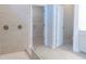 Modern bathroom with double shower heads, ceramic tiles, and an adjacent closet at 464 Eager Ct, Marietta, GA 30064